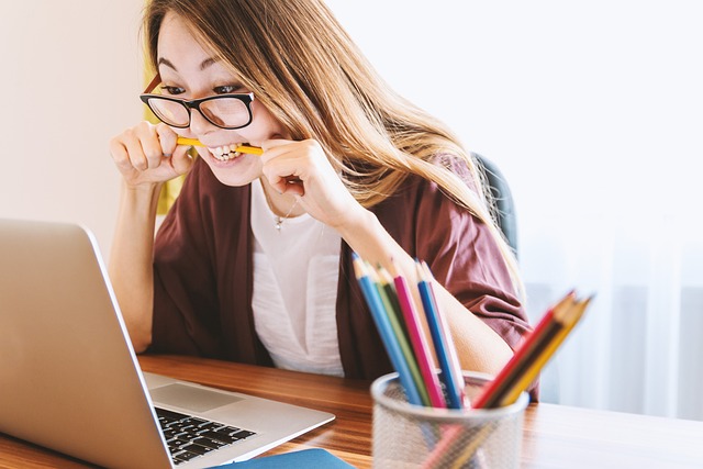 girl looking at laptop