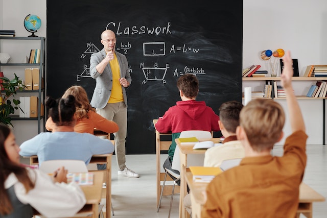teacher and students in classroom