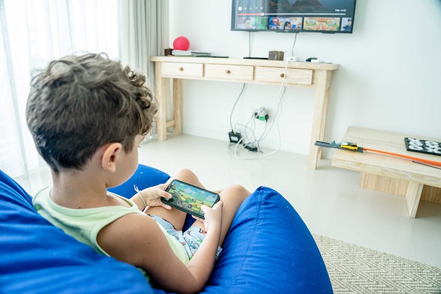 boy playing video game