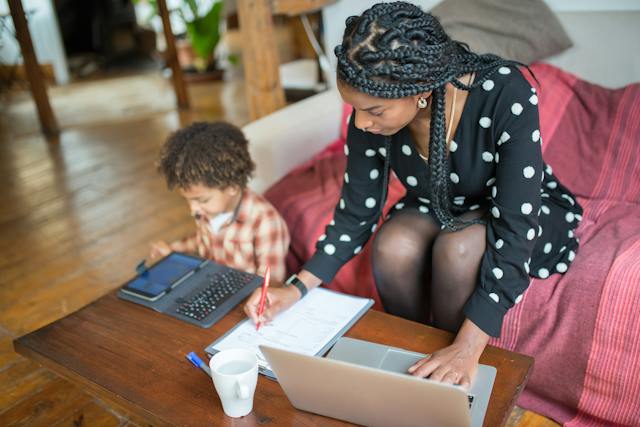 mum working next to child