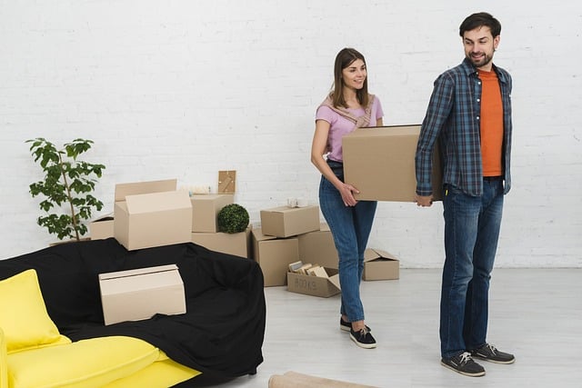 couple with moving boxes
