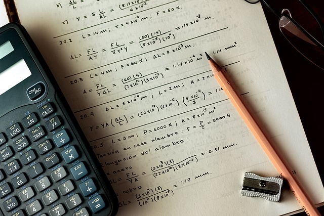 notes, pencil and calculator