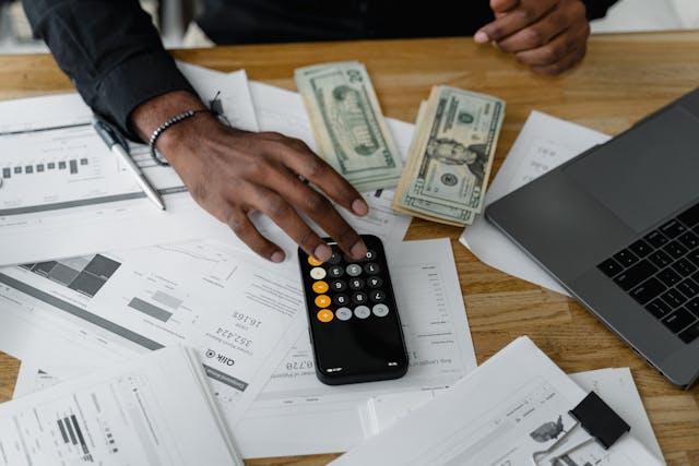 person calculating costs